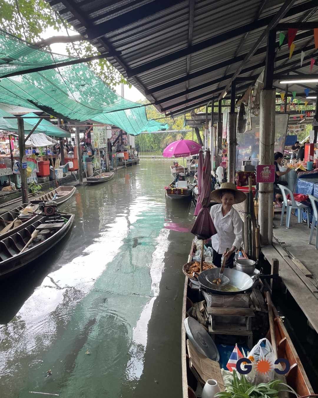 smiling Thai woman in floating market bangkok thailand